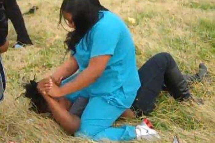 Two women fighting (illustration purposes)