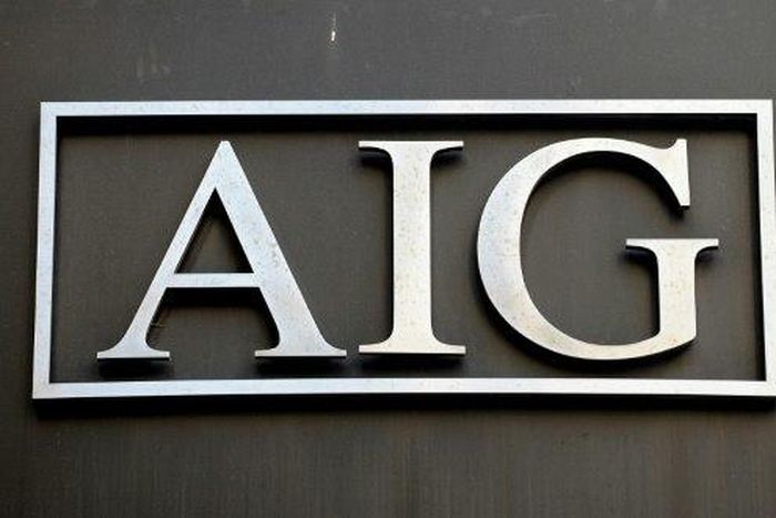 AIG reported a loss of $3.0 billion in the fourth quarter following a hefty charge to build reserves for future losses