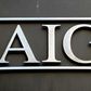 AIG reported a loss of $3.0 billion in the fourth quarter following a hefty charge to build reserves for future losses