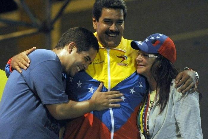 Venezuelan President Nicolas Maduro's son, Nicolas Ernesto Maduro, left, is joining his father's disputed assembly to rewrite the constitution