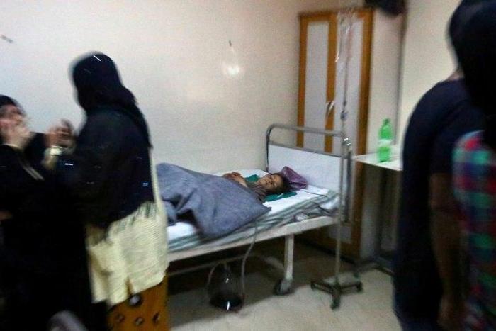An injured child lies on a bed at a hospital in Syria’s northeastern city of Hassakeh