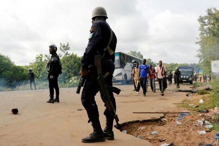 Four people were killed when police clashed May 23 with former rebels who had blocked the road into Bouake, Ivory Coast's second biggest city, to demand government compensation payments
