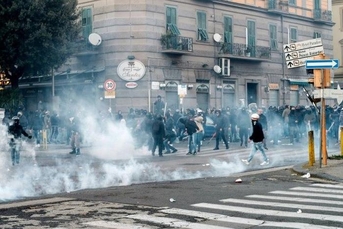 A group of people clash with police during a rally organized by citizens and social community against the political meeting of Matteo Salvini, general secretary of Italian far-right party Lega Nord on March 11, 2017 in Naples