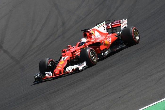Ferrari's German driver Sebastian Vettel races at the Hungaroring circuit in Budapest on July 30, 2017, during the Formula One Hungarian Grand Prix