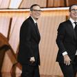 Writer/producer Tim Carvell (L) and TV personality John Oliver accept Outstanding Variety Talk Series for 'Last Week Tonight with John Oliver' at the 2016 Emmy Awards