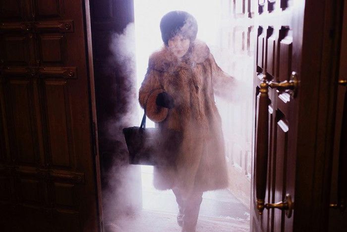 A woman enters the city cathedral in Yakutsk