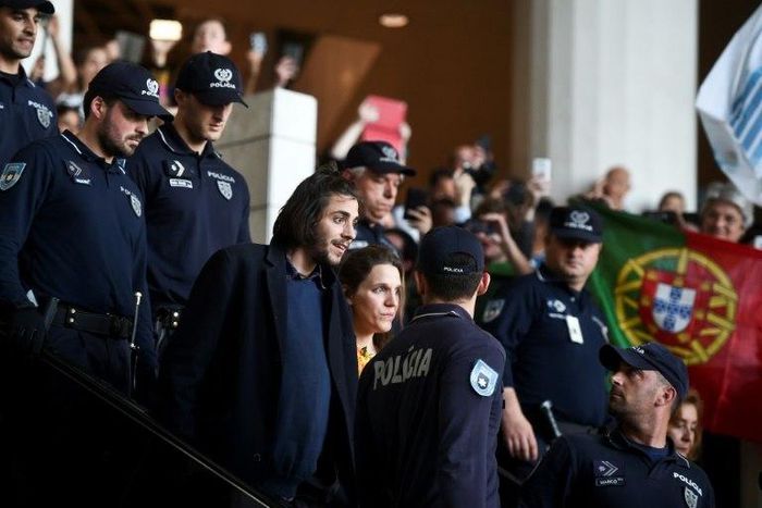 Eurovision contest winner Salvador Sobral is greeted by hundreds of cheering fans as he returns to Portugal from Kiev