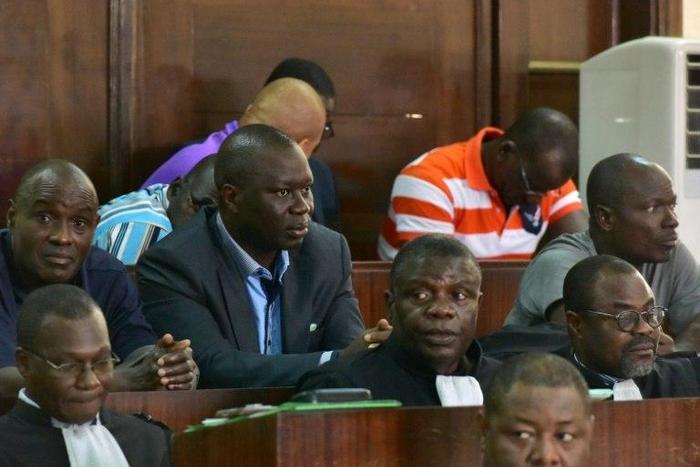 General Brunot Dogbo Ble, seen wearing a blue shirt during the trial, was sentenced to 18 years