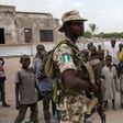 A Nigerian soldier patrols in the town of Banki in northeastern Nigeria on April 26, 2017. Banki has been totally destroyed during battles between the Nigerian army and Boko Haram insurgents. Over 32,000 people live in the town but free movement is lim...