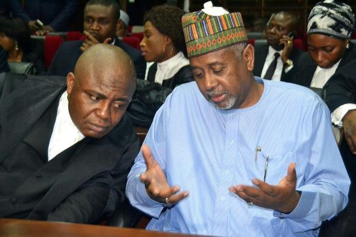 Former national security adviser Sambo Dasuki (R) allegedly oversaw a sprawling embezzlement scheme that saw "phantom contracts" awarded for personal gain, as under-equipped troops fought better-armed militants