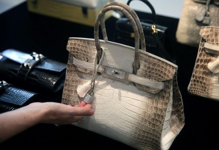 A Himalaya Niloticus Crocodile Diamond Birkin handbag with 18K gold and diamond hardware like this one has just broken the record for the world's most expensive handbag ever sold at auction, fetching nearly US$380,000 in a Hong Kong sale