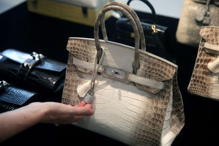 A Himalaya Niloticus Crocodile Diamond Birkin handbag with 18K gold and diamond hardware like this one has just broken the record for the world's most expensive handbag ever sold at auction, fetching nearly US$380,000 in a Hong Kong sale
