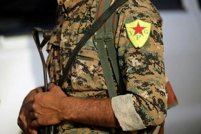 The United States begins a small arms weapons transfer to Kurdish fighters battling the Islamic State in Raqa