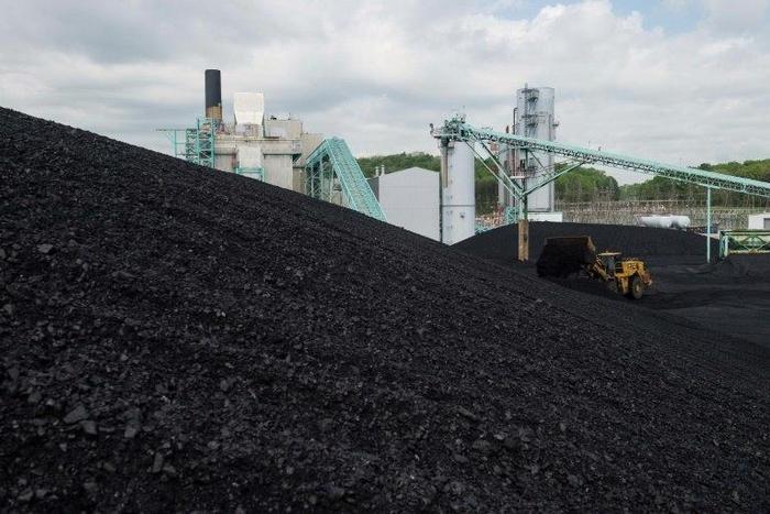 US President Donald Trump, who declared an end to the "war on coal", has said he will make a decision on the Paris agreement on limiting global warming after he returns to Washington