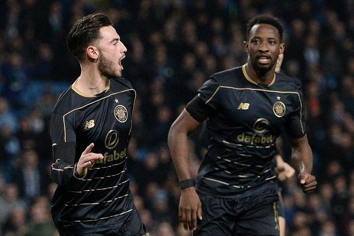 Celtic's Patrick Roberts (L) celebrates after scoring a goal during a Champions League match in Manchester, in December 2016