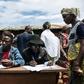 Determined to have a taste of much-delayed democracy in the troubled country, many turned out at make-shift polling stations for a staged vote