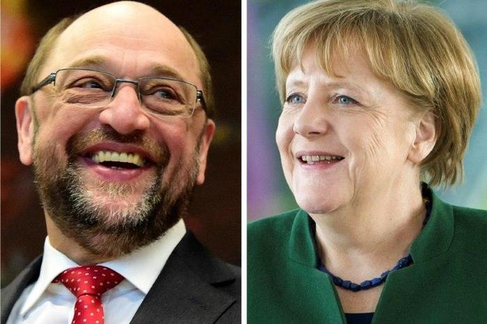 Social Democratic leader Martin Schulz (left) has failed to maintain his party's hold on North Rhine-Westphalia against Chancellor Angela Merkel's CDU