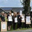 "Chickens have feelings too": Dutch animal activists wave banners and placards as they stage a protest at a poultry farm in Witteveen