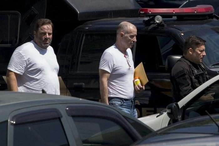 Brazil Supreme Court Justice Gilmar Mendes said while businessman Eike Batista's (C) alleged crimes were serious, they did not warrant being jailed during legal proceedings