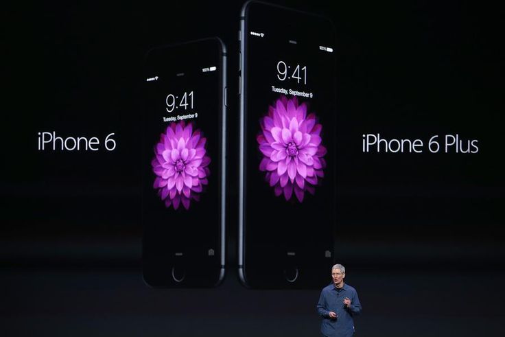 Apple CEO, Tim Cook, unveils the new iPhone 6 and iPhone 6 Plus on Sept. 9, 2014 in California, U.S.A.