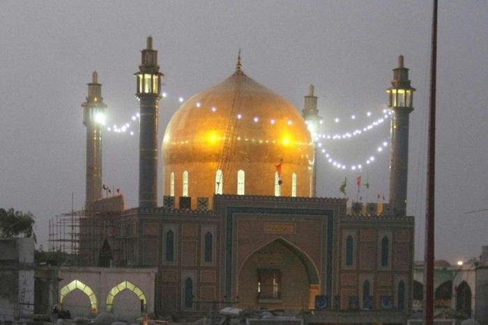 Pakistani devotees gather at the 13th-century Lal Shahbaz Qalandar shrine in Sehwan in 2014