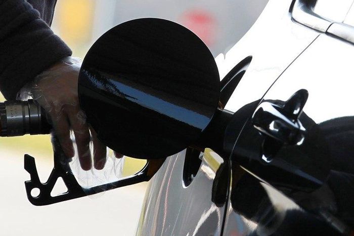 A driver pumps petrol into his car at a petrol station in Brussels, file.    REUTERS/Yves Herman