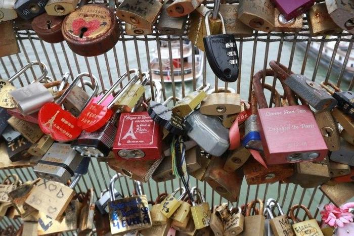 The trend for leaving 'love locks' on Paris bridges eventually became an eyesore and a danger