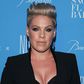 Pink shares a post of breastfeeding her son.