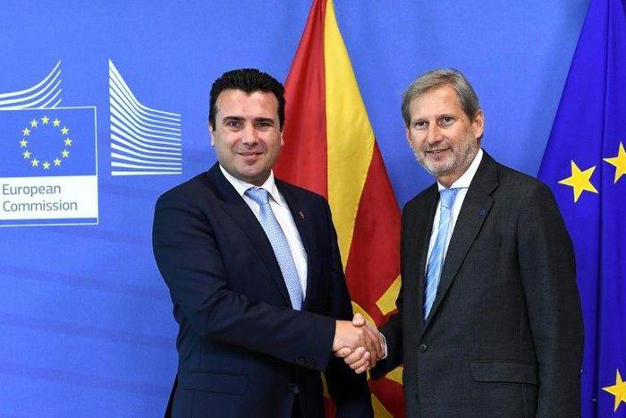 Macedonian Prime Minister Zoran Zaev (L) with Commissioner of European Neighbourhood Policy and Enlargement Negotiations Johannes Hahn, at the European Commission in Brussels, where Zaev hopes to renew discussions of Macedonia joining NATO and the EU
