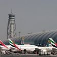 FILE PHOTO: Emirates Airlines aircrafts are seen at Dubai International Airport, United Arab Emirates May 10, 2016.