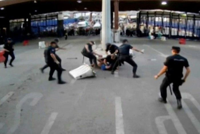 Spanish police apprehend a man armed with a knife at a border crossing between Morocco and the Spanish territory of Melilla on July 25, 2017