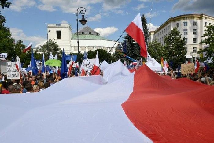 Hundreds of government opponents protest in front of the parliament building in Warsaw, on July 16, 2017
