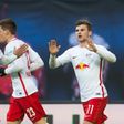 Leipzig's Timo Werner (R) celebrates with teammates after scoring against Hoffenheim in Leipzig, eastern Germany on January 28, 2017