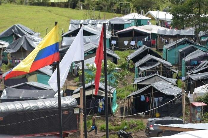 Colombia's FARC rebels will keep some arms for transitional security at their demobilization camps like this one in Mesetas municipality
