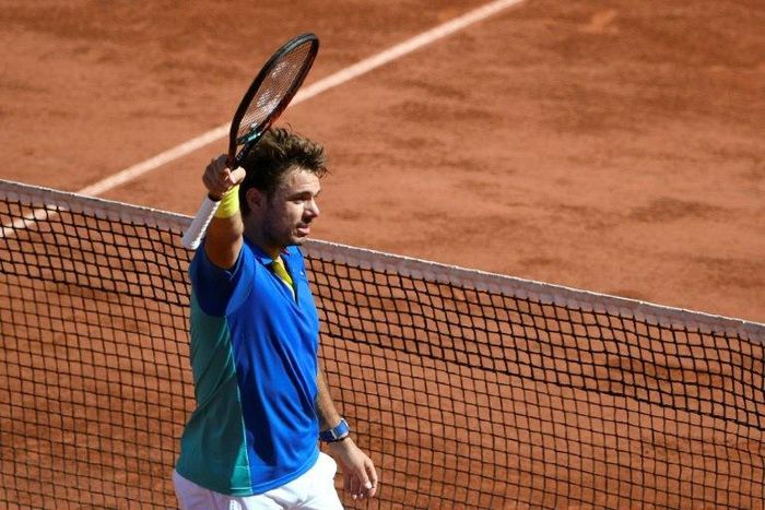 Switzerland's Stanislas Wawrinka celebrates after winning his semifinal tennis match against Britain's Andy Murray at the Roland Garros 2017 French Open on June 9, 2017 in Paris