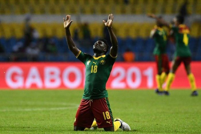 Cameroon's midfielder Robert Ndip Tambe celebrates at the end of their 2017 Africa Cup of Nations match against Guinea-Bissau at the Stade de l'Amitie Sino-Gabonaise in Libreville on January 18, 2017