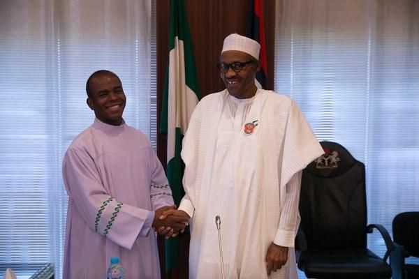 Rev. Fr. Ejike Mbaka and President Muhammadu Buhari.