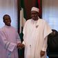 Rev. Fr. Ejike Mbaka and President Muhammadu Buhari.