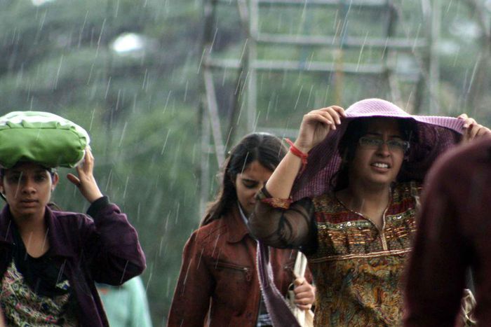 People under the rain in Shimla