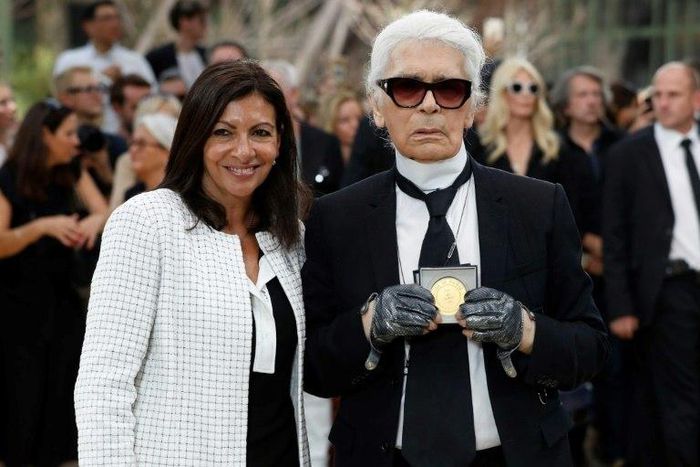 Paris Mayor Anne Hidalgo awarded German fashion designer Karl Lagerfeld the city's Grand Vermeil medal, calling him "an immense talent and a wonderful person"