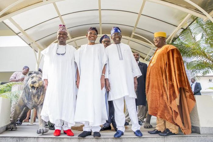 Aregbesola, Tinubu (center)