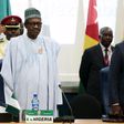 Nigeria's President Muhammadu Buhari (C) stands at the opening of the 48th ordinary session of ECOWAS Authority of Head of States and Government in Abuja, Nigeria, December 16, 2015 REUTERS/Afolabi Sotunde