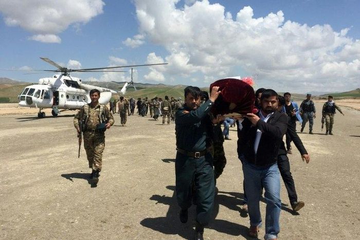 Relatives carry the coffin of a Afghan National Army soldier killed during a Taliban attack in Takhar Province. NATO will supply more troops following recent Taliban gains