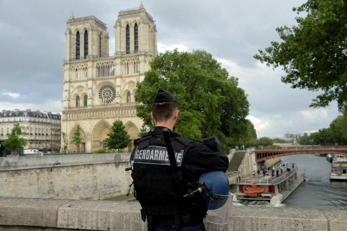 The attacker targeted French police officers standing outside Notre Dame cathedral in the heart of Paris