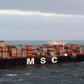 A Dutch maritime emergencies services aerial photo shows the MSC ZOE, which was headed for Bremerhaven in norhtern Germany after losing up to 270 containers, including three with potential hazardous material, in a North Sea storm