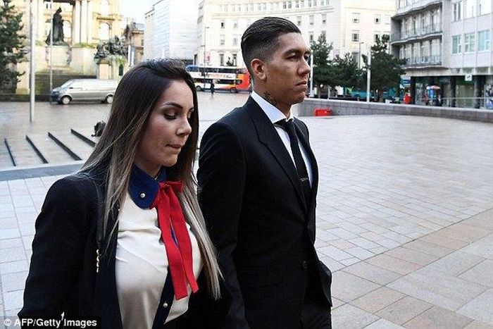 Roberto Firmino and Larissa Pereira