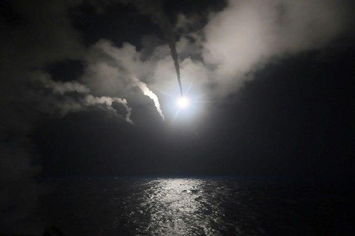 The guided-missile destroyer USS Porter fires missiles at Syria from the Mediterranean Sea on April 7, 2017