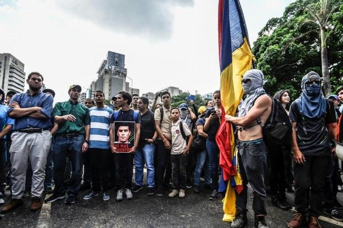 Venezuela opposition leader Henrique Capriles joins a march paying tribute to student Juan Pablo Pernalete killed during a protest against President Nicolas Maduro