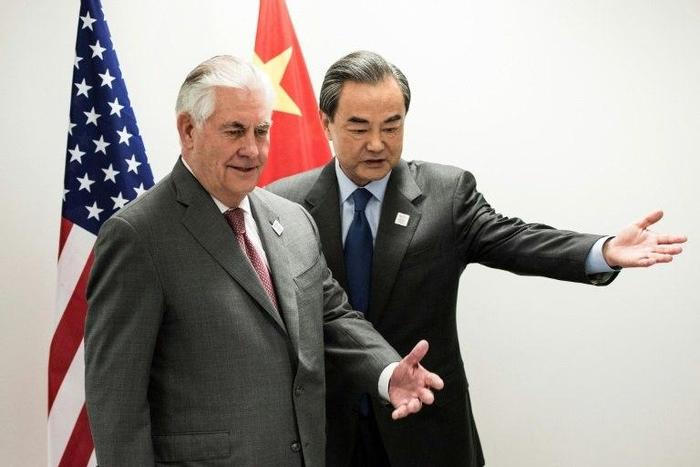 US Secretary of State Rex Tillerson (L) and China's Foreign Minister Wang Yi meet on the sidelines of athe G20 in Bonn, western Germany, February 17, 2017