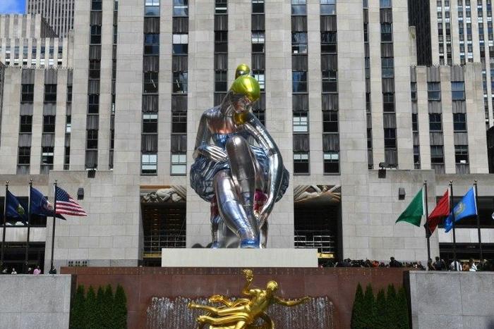 The public art exhibition of a 45-foot tall inflatable nylon sculpture depicting a seated ballerina from artist Jeff Koons' Antiquity series titled "Seated Ballerina " is unveiled on May 12, 2017 at Rockefeller Center in New York
